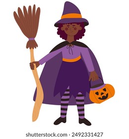 Little girl in Witch Costume holding pumpkin bag and a broom. Child celebrate Halloween wears witch costume.