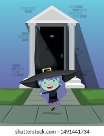 little girl with witch costume in the house door
