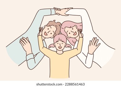 Little girl and young parents smiling lying together for happy family vacation concept, top view. Positive mom and dad near daughter holding hands and having fun enjoying family holiday