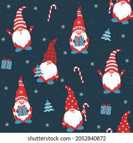 Little gnomes seamless pattern on a dark blue background. Christmas gnome in a hat holding a gift, a Christmas tree and a candy. Fairytale character for the New Year's backdrops. Vector wallpaper. 