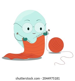 little halloween ghost trying to knit a scarf for himself