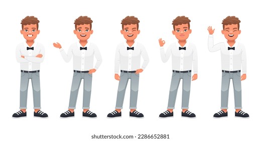 A little handsome boy stands with his arms crossed, points to something, waves his hand, shows an OK sign. Cute white baby stands in different poses. Guy in full growth.