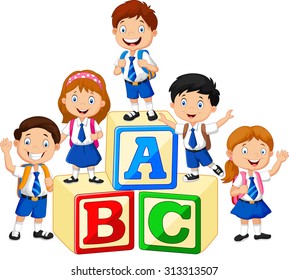 Little happy children with alphabet block