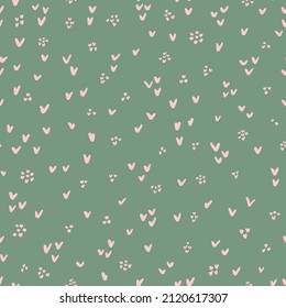 Little hearts with dots seamless repeat pattern. Romantic, doodled love signs and spots all over surface print on sage green background.