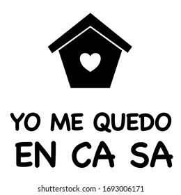There’s a little house with a word Stay At Home in Spanish inside. It’s a sign following the COVID-19 campaign, stay at home campaign. Protective yourself and other by stay at home.