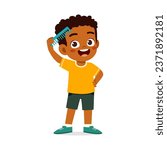 little kid comb hair and feel happy