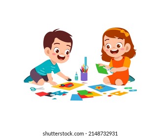 little kid cut paper for art with friend