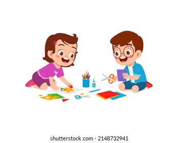 little kid cut paper for art with friend