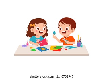 little kid cut paper for art with friend