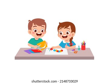 little kid cut paper for art with friend