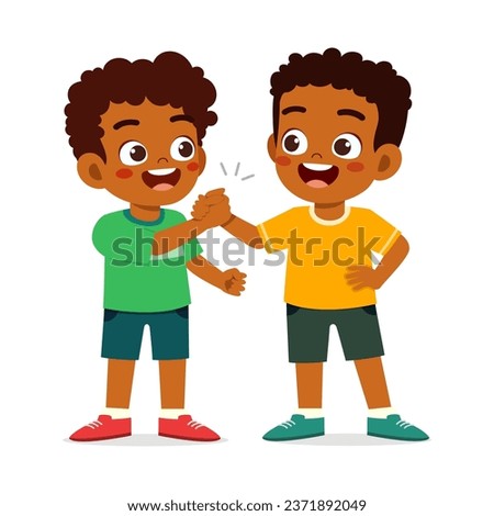 little kid do handshake with friend