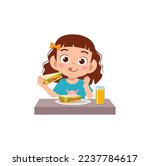 little kid eating sandwich and feel happy