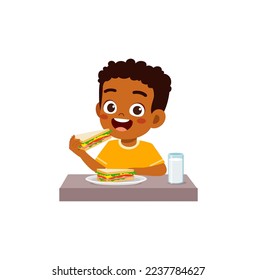 little kid eating sandwich and feel happy