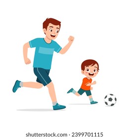 niño pequeño con padre jugando al fútbol