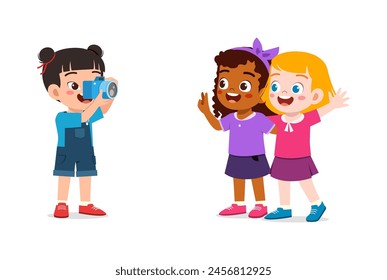 little kid holding camera and take photo of friend