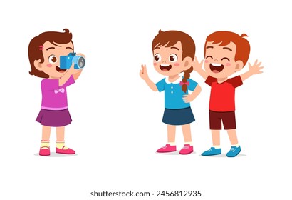 little kid holding camera and take photo of friend
