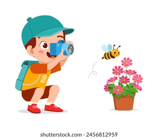 little kid holding camera and take photo of bee