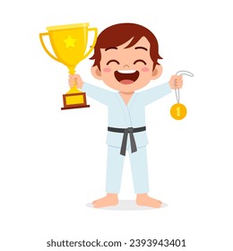 little kid holding trophy winning in sport