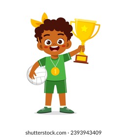 little kid holding trophy winning in sport