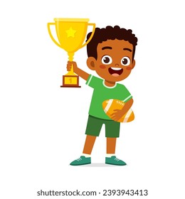 little kid holding trophy winning in sport