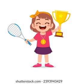 little kid holding trophy winning in sport