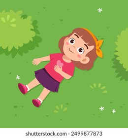 little kid lay down on park and feel happy