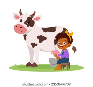 little kid milking cow and feel happy