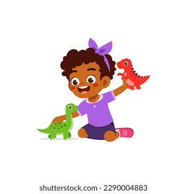 little kid play with dinosaur toy and feel happy