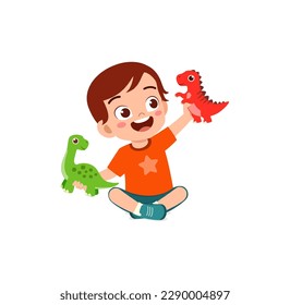 little kid play with dinosaur toy and feel happy