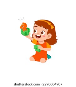 little kid play with dinosaur toy and feel happy