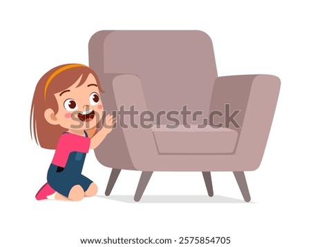 little kid play hide and seek and hiding behind chair