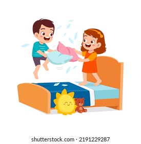 little kid play pillow fight with friend