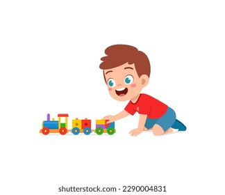 little kid playing toy train made from plastic and feel happy