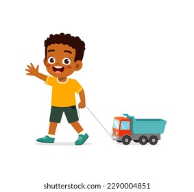 little kid playing a toy truck and feel happy