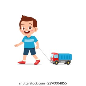 little kid playing a toy truck and feel happy