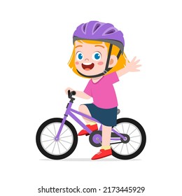 little kid ride bike and wear helmet