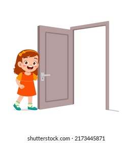 Little Kid Standing And Holding Door Knob