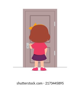 Little Kid Standing And Holding Door Knob