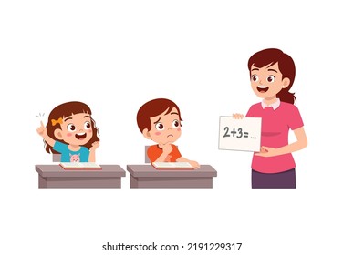 little kid study math in class with teacher