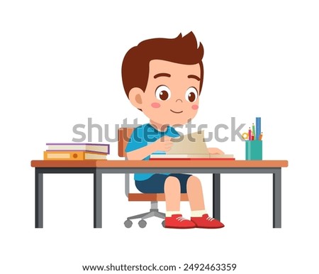 little kid study on desk and feel happy