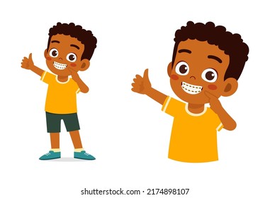 little kid using dental braces and feel happy