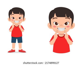 Little Kid Using Dental Braces And Feel Happy