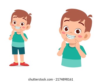 little kid using dental braces and feel happy