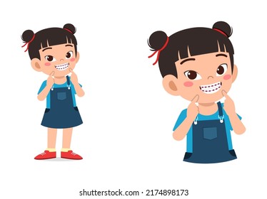 little kid using dental braces and feel happy