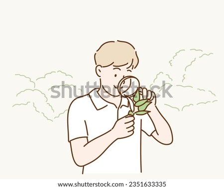 A Little Kid Using Magnifier. Hand drawn style vector design illustrations.