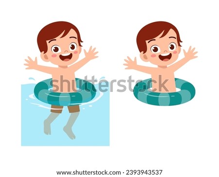 little kid using swim ring for swimming