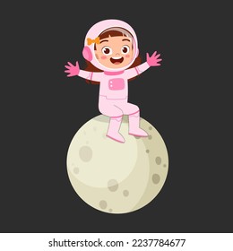 little kid wearing astronaut costume and sit on the little moon