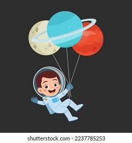 little kid wearing astronaut costume and holding balloon