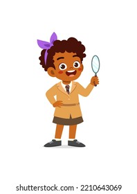 little kid wearing detective costume and holding magnifying glass