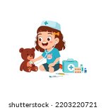 little kid wearing doctor costume and play